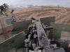 Бійці підрозділу “Whisky Squad” на українському “Humvee” ведуть вогонь із кулемета Browning M2 у бою... Бійці-підрозділу-“whisky-squad”-на-українському-“humvee”-ведуть-вогонь-із-кулемета-browning-m2-у-бою.